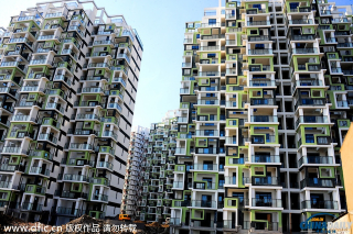 Illustration for article titled A Look At China's Dizzying "Rubik's Cube" Buildings
